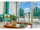 Ocean view from balcony with teal chairs at 713 N Ocean Blvd. # 204, Surfside Beach, SC 29575