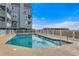 Community pool with ample deck space at 713 N Ocean Blvd. # 204, Surfside Beach, SC 29575