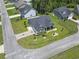 Aerial view of a well-maintained home, manicured lawn, and surrounding neighborhood at 901 Queensferry Ct., Conway, SC 29526