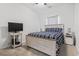 Bedroom with striped bedding and a TV stand at 901 Queensferry Ct., Conway, SC 29526