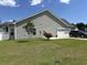 Home exterior with garage, lawn, and lovely landscaping and driveway at 901 Queensferry Ct., Conway, SC 29526