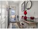 Welcoming foyer featuring hardwood floors and stylish decor at 901 Queensferry Ct., Conway, SC 29526
