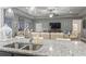 Granite kitchen island with double sink, overlooking the living room at 901 Queensferry Ct., Conway, SC 29526