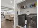 Laundry room with washer, dryer, and storage shelving at 901 Queensferry Ct., Conway, SC 29526