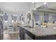 Spacious living area featuring a kitchen island, dining area, and a comfortable seating area at 901 Queensferry Ct., Conway, SC 29526