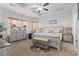 Bright main bedroom featuring a decorative ceiling, a ceiling fan, and neutral tones for a serene atmosphere at 901 Queensferry Ct., Conway, SC 29526