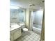 Clean bathroom with tub, shower, and vanity at 9550 Shore Dr. # 1132, Myrtle Beach, SC 29572