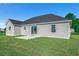 Rear view of house with sliding glass doors and patio at Tbd Hodges Rd., Conway, SC 29527