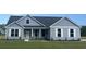 Newly constructed home with gray siding and a white trim at Tbd Hodges Rd., Conway, SC 29527