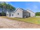 Side view of a gray sided home with a patio at Tbd Hodges Rd., Conway, SC 29527