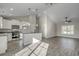 Open concept kitchen with island, white cabinets, and granite countertops at Tbd Hodges Rd., Conway, SC 29527