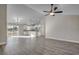 Modern kitchen with island, white cabinets, and hardwood floors at Tbd Hodges Rd., Conway, SC 29527