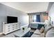 Ocean view living room with comfy seating and a large TV at 1207 S Ocean Blvd. # 20507, Myrtle Beach, SC 29577