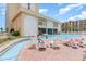 Relaxing pool area with lounge chairs and a large pool at 1207 S Ocean Blvd. # 20507, Myrtle Beach, SC 29577