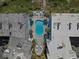 Complex featuring a kidney-shaped pool, surrounded by buildings and parking at 1809 S Ocean Blvd. S # J2, North Myrtle Beach, SC 29582