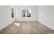 Bright bedroom with large windows and light wood flooring at 1816 Tryon Dr, Myrtle Beach, SC 29588