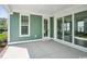 A covered patio with sliding glass doors offering indoor outdoor living at 1816 Tryon Dr, Myrtle Beach, SC 29588