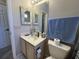 Small bathroom with toilet and vanity at 1818 Topsail Ln., North Myrtle Beach, SC 29582