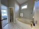 Bathroom with a jetted tub and tiled flooring at 1818 Topsail Ln., North Myrtle Beach, SC 29582