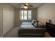 Bedroom with large bed, ceiling fan, and dresser at 1818 Topsail Ln., North Myrtle Beach, SC 29582