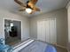 Bedroom with a view into another room and double doors at 1818 Topsail Ln., North Myrtle Beach, SC 29582