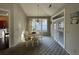 Charming dining area with a round table and access to a patio at 1818 Topsail Ln., North Myrtle Beach, SC 29582