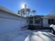 House exterior with attached two-car garage at 1818 Topsail Ln., North Myrtle Beach, SC 29582