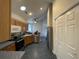 Galley kitchen with stainless steel appliances and ample cabinet space at 1818 Topsail Ln., North Myrtle Beach, SC 29582