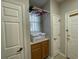 Laundry room with built-in cabinets and extra storage at 1818 Topsail Ln., North Myrtle Beach, SC 29582