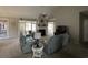 Bright living room featuring vaulted ceilings and a fireplace at 1818 Topsail Ln., North Myrtle Beach, SC 29582