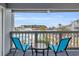 Balcony overlooking the community pool and surrounding area at 1890 Colony Dr. # 17-G, Surfside Beach, SC 29575