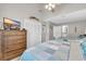 Bedroom with two twin beds and access to a full bathroom at 1890 Colony Dr. # 17-G, Surfside Beach, SC 29575
