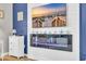 Modern electric fireplace with beachy decor at 1890 Colony Dr. # 17-G, Surfside Beach, SC 29575
