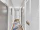 Hallway with doors to bedrooms, and a linen closet at 1890 Colony Dr. # 17-G, Surfside Beach, SC 29575