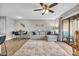 Living area with sectional sofa and access to balcony at 1890 Colony Dr. # 17-G, Surfside Beach, SC 29575