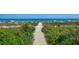 Sandy pathway leads to a beautiful beach with ocean views at 2004 N Ocean Blvd. # 1472, Myrtle Beach, SC 29572