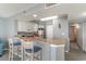 A view of the kitchen with granite countertops, stainless appliances, and a breakfast bar with seating at 2504 North Ocean Blvd. # 436, Myrtle Beach, SC 29577