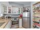 Well-lit kitchen features granite countertops, stainless steel appliances, and ample storage space at 2504 North Ocean Blvd. # 436, Myrtle Beach, SC 29577