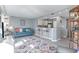 Open living area featuring a bright sofa, breakfast bar, and well-lit with natural light at 2504 North Ocean Blvd. # 436, Myrtle Beach, SC 29577