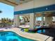 Inviting pool area with unique lazy river feature and ample seating under covered area at 2504 North Ocean Blvd. # 436, Myrtle Beach, SC 29577