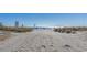 Sandy beach access path to the ocean at 2710 Ocean Blvd. S # 406, Myrtle Beach, SC 29577