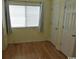 Simple bedroom with light walls and hardwood floors at 2710 Ocean Blvd. S # 406, Myrtle Beach, SC 29577