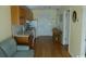 Efficient kitchen with granite countertops and wooden cabinets at 2710 Ocean Blvd. S # 406, Myrtle Beach, SC 29577
