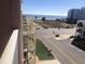 Balcony view of the ocean and street at 2710 Ocean Blvd. S # 406, Myrtle Beach, SC 29577