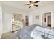 Sunlit bedroom featuring a dresser, carpet flooring, and neutral wall colors at 287 Palmetto Sand Loop, Conway, SC 29527