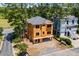 Aerial view of new home construction shows neighborhood with mature trees at 301 Crossing Ct., Myrtle Beach, SC 29588