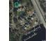 Aerial view of property's location surrounded by houses, pond, boat parking, and the highway at 301 Crossing Ct., Myrtle Beach, SC 29588