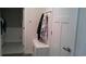 Bright laundry room with washer, dryer, and storage bench at 325 Golan Circle # 12B, Myrtle Beach, SC 29579