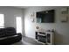 Living room features a large TV, fireplace, and comfortable seating at 325 Golan Circle # 12B, Myrtle Beach, SC 29579