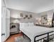 Bright and airy bedroom featuring hard wood floors, modern decorations, and closet access at 415 Ocean Creek Dr. # 2139, Myrtle Beach, SC 29572
